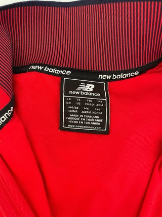 Sudadera Sevilla FC New Balance.