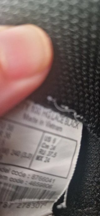 Zapatillas de fútbol negras y verdes