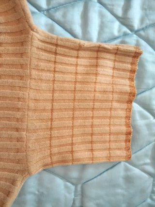 Jersey-chaleco naranja.