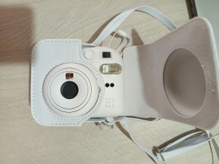 Fujifilm Instax Mini 12 + funda + álbum