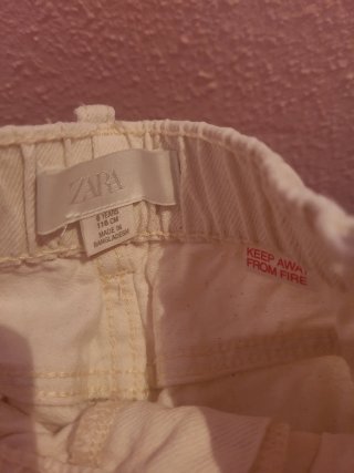 Pantalones Zara T6 florales y beige