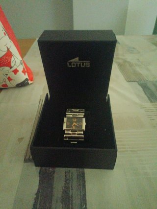 Reloj Lotus Dorado y Naranja