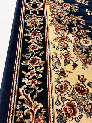 Alfombra beige y azul
