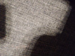 Silla de oficina gris giratoria