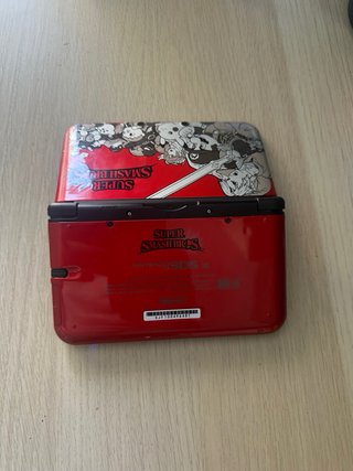 Nintendo 3DS XL Super Smash Bros + 16 juegos