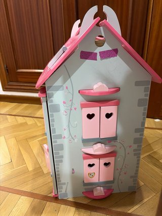 Casa de muñecas de madera rosa