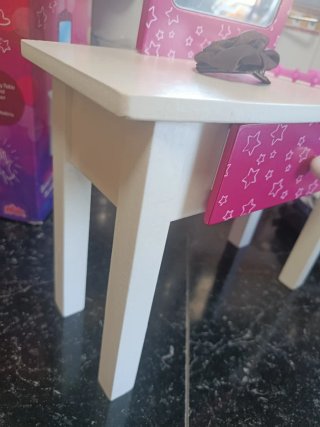Tocador de muñeca rosa con estrellas