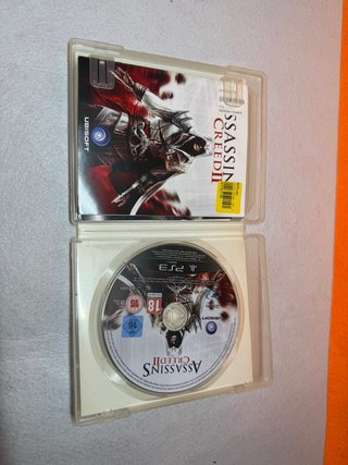 Juegos PS3 Skyrim y Assassin's Creed 2