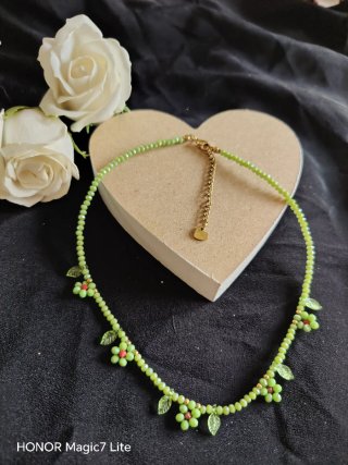 Collana con margheritine verdi e oro