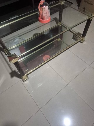 Mesa de centro cristal y metal dorado