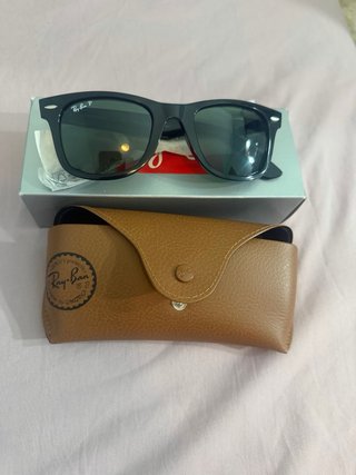 Gafas de sol Ray-Ban negras y amarillas