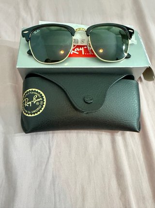 Gafas de sol Ray-Ban negras y amarillas