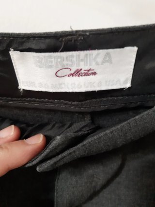 Conjunto chaleco y pantalón corto gris