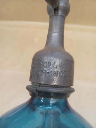 Sifón antiguo azul tapón plomo