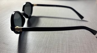 Gafas de sol Miu Miu Regard Negras