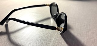 Gafas de sol Miu Miu Regard Negras