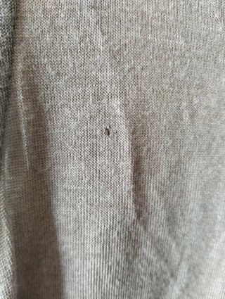 Chaleco fino gris con encaje