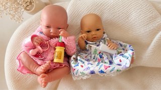 Lote 2 muñecos bebé con ropa y accesorios