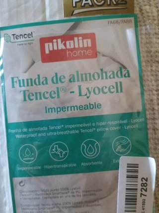 Fundas de almohada de tela blanca