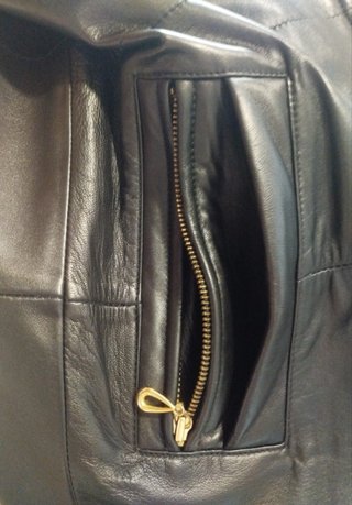Chaquetón largo de piel y cuello de pelo de zorro