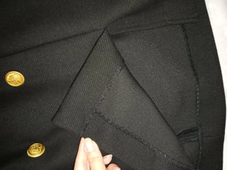 Falda elegante negra botones dorados