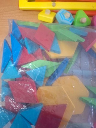 2 juegos madera uno rampas y el otro juego piezas