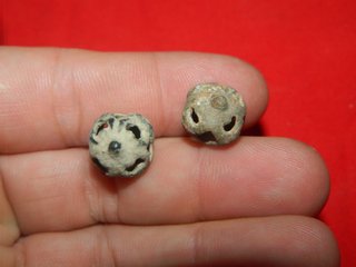 Pareja curiosos y antiguos pendites ibero romanos