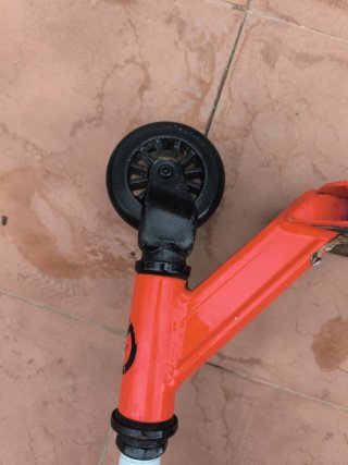 Patín ( oxelo )  de freestyle naranja y negro