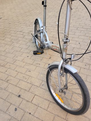 Bicicleta plegable plateada