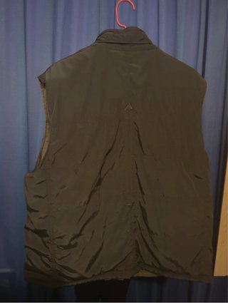 Chaleco reversible marrón y negro