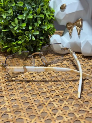 Gafas sin montura doradas lujo