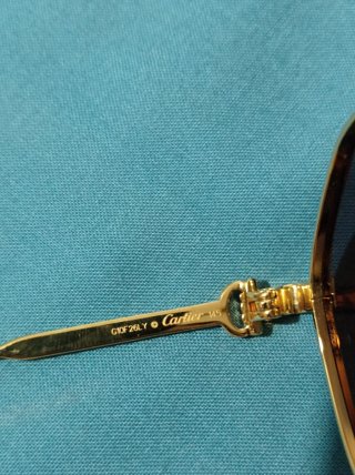 Gafas de sol Cartier doradas y azules