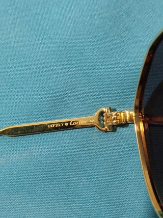 Gafas de sol Cartier doradas y azules