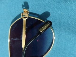 Gafas de sol Cartier doradas y azules