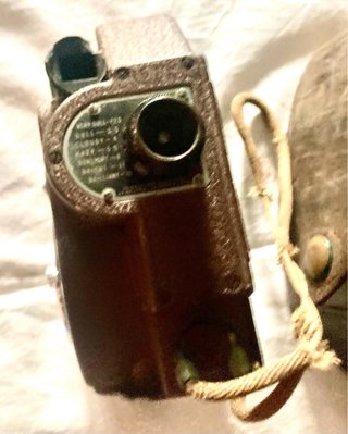 Cinepresa antica marrone e argento