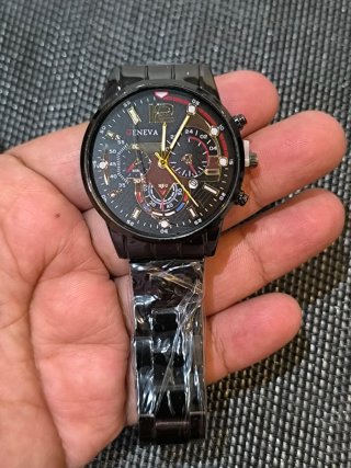 Reloj de hombre plateado y negro y dorado 3x1