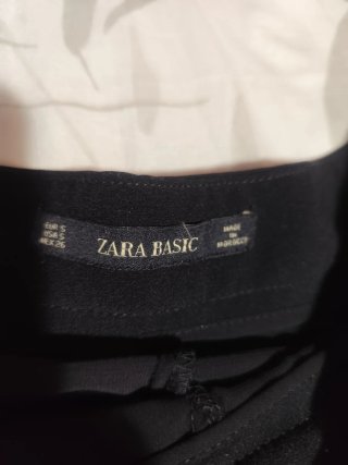 Pantalón corto negro volantes
