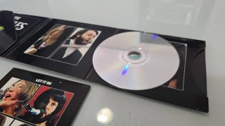 CDs Beatles Abbey Road y Let It Be (2009)