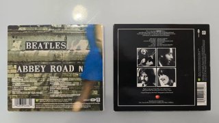 CDs Beatles Abbey Road y Let It Be (2009)