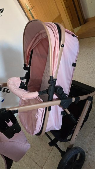 Carrito de bebé rosa