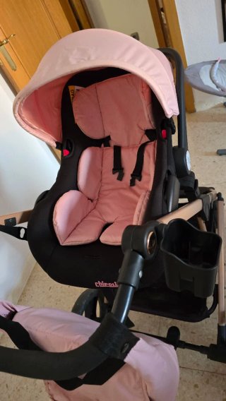 Carrito de bebé rosa