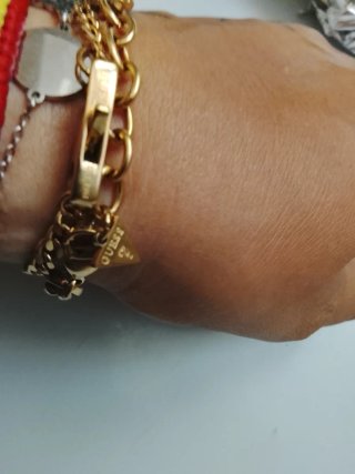 Pulsera Guess dorada con circonitas