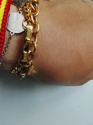 Pulsera Guess dorada con circonitas