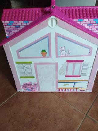 Casita muñecas transportable.