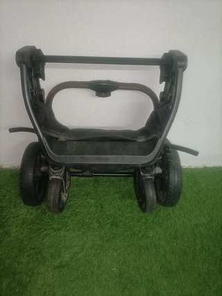 Carro de bebé rosa y negro