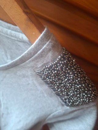 Camiseta Esmara gris talla L con detalle