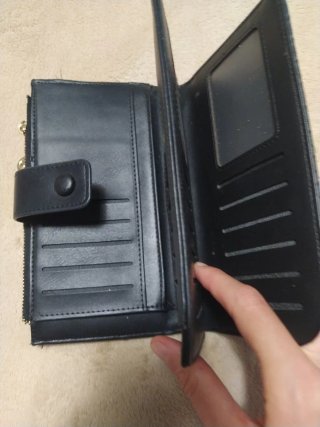 Monedero negro tejido con cadena