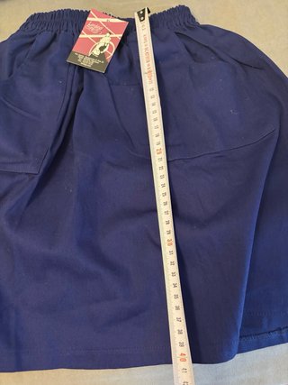 Falda azul arrantzal con bolsillos