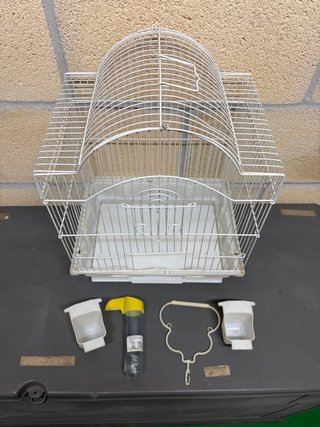 Jaula para pájaros con accesorios