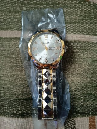 Reloj hombre oro y plata